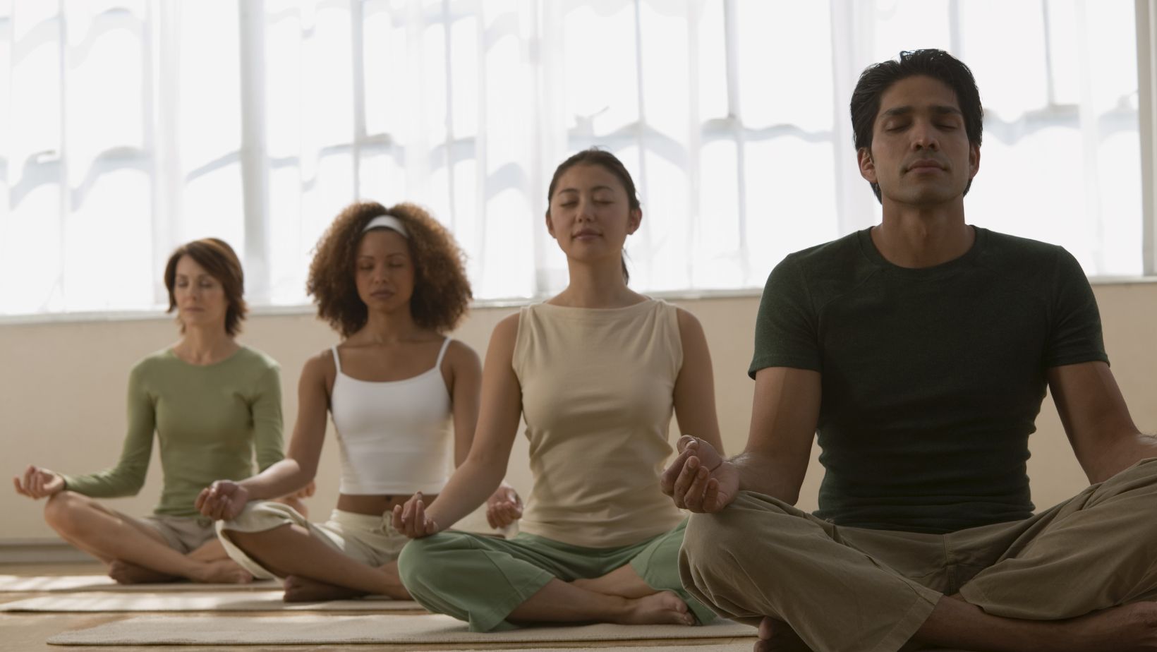 C&C Search Images on Recruitment London - Men and women in a group meditation or yoga class
