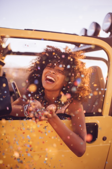 Woman smiling in a car going to candc search boutique recruitment agency